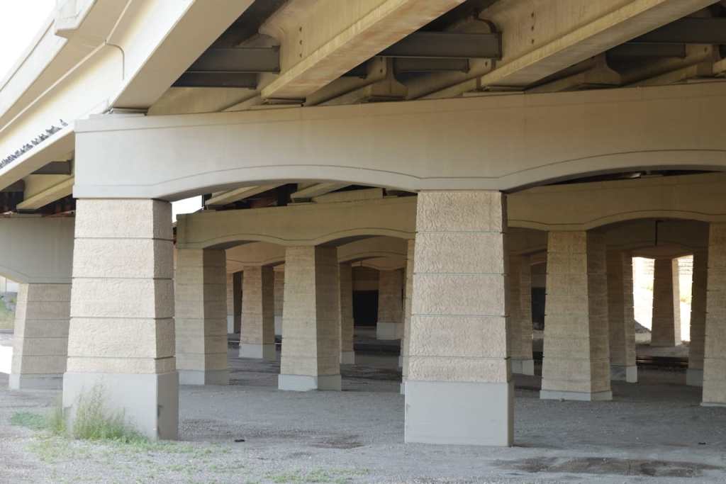 The concrete pillars supporting I-35E north and south and on and off ramps at Cayuga Street, just north of Downtown – 12 lanes total - create a cement maze.