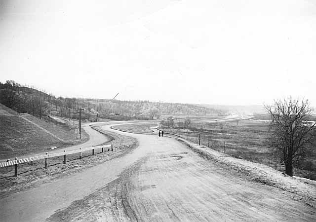 Point Douglas Road near the junction with Warner Road was partially unpaved in 1938. Courtesy Minnesota Historical Society