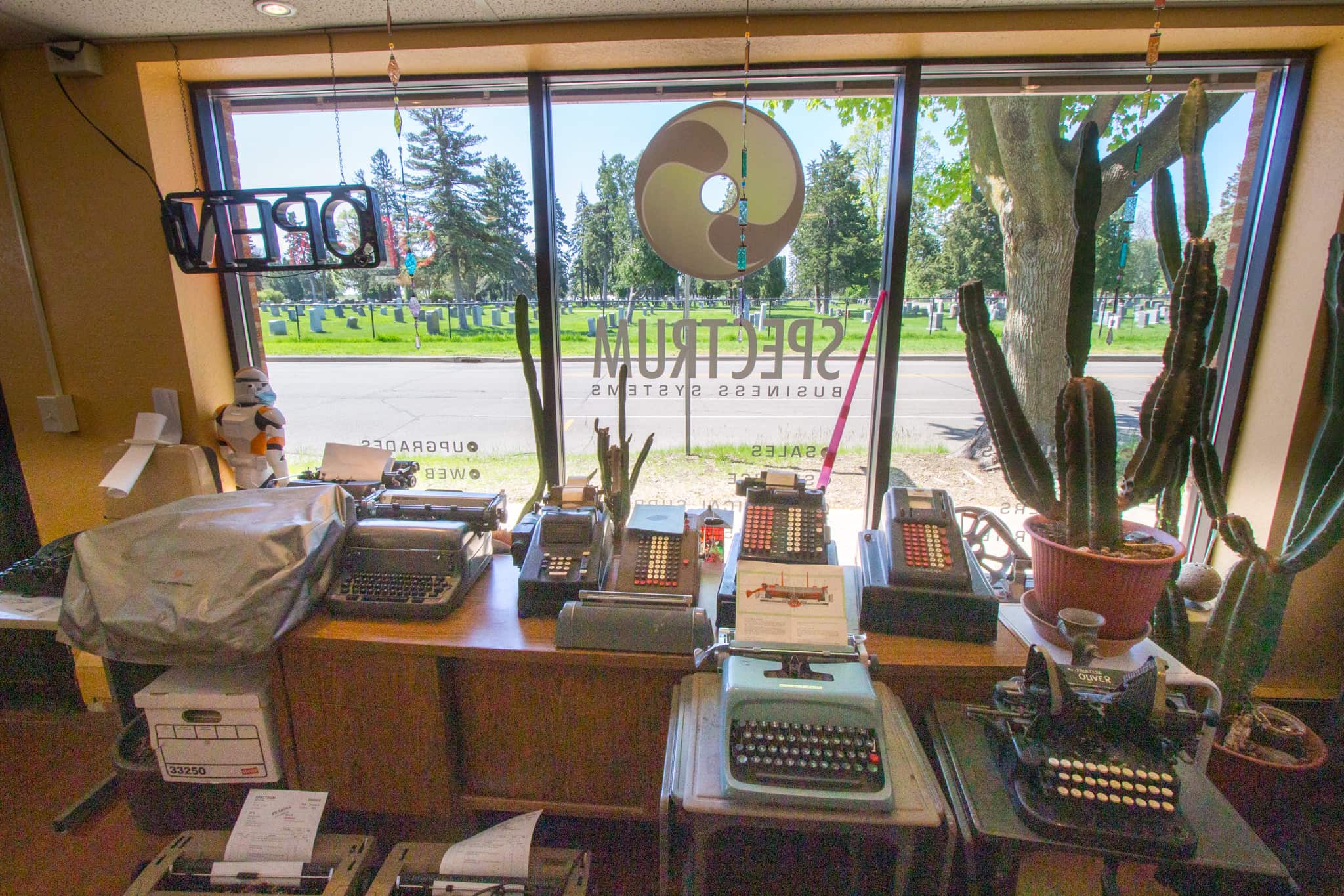 Typewriters and an adding machine; Spectrum Business Systems